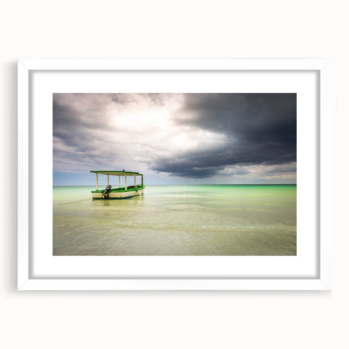 Textured art abstract print of Caribbean scenery in muted blue and green tones, framed with a white mat.