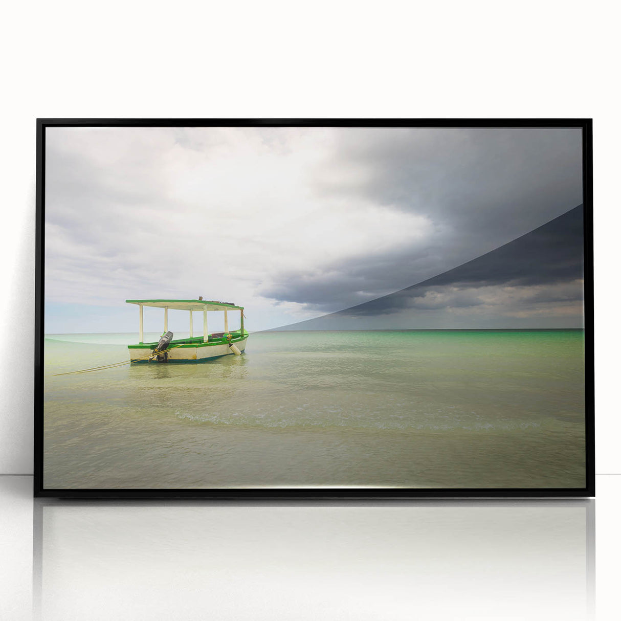 Large abstract wall art depicting a Caribbean scenery in muted blue and green tones, framed in black acrylic.
