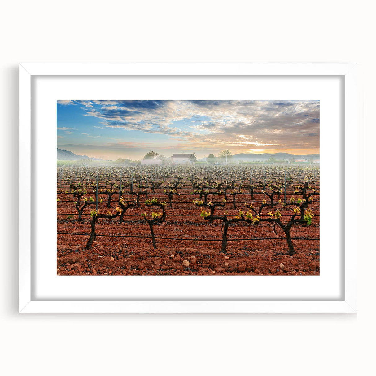 Abstract art print of Valencia scenery in muted earth tones on a white framed canvas, suitable for dining room decor.