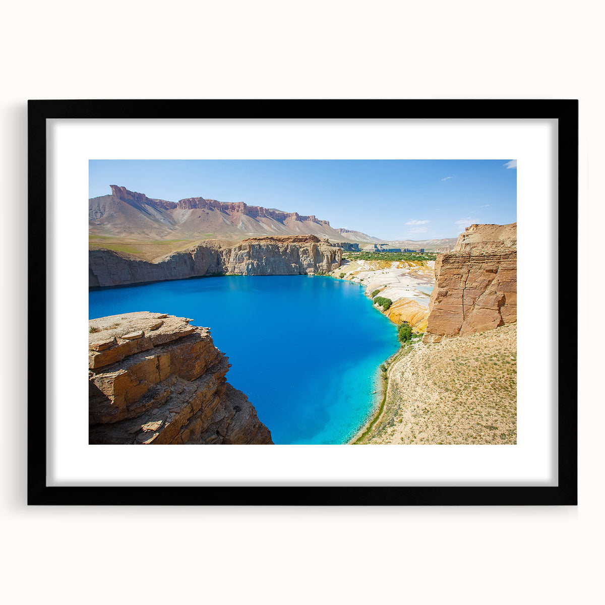 Extra large abstract art print of a colorful, textured Middle Eastern scenery on a black framed canvas.