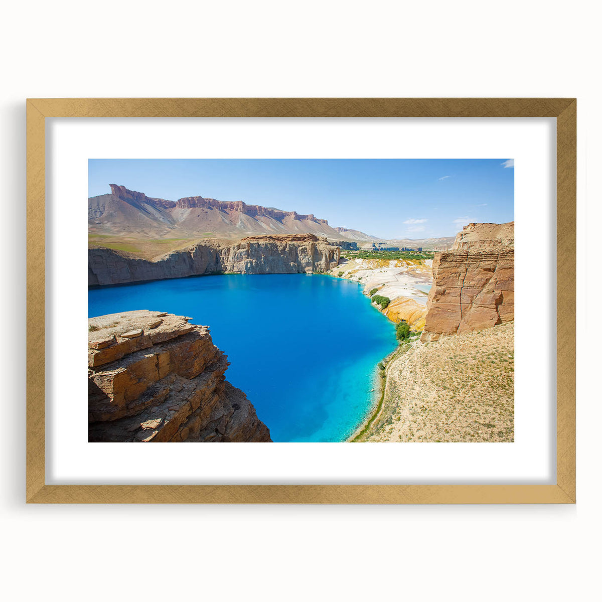 Extra large abstract art print depicting a textured Middle Eastern scenery in muted earth tones, framed in gold.