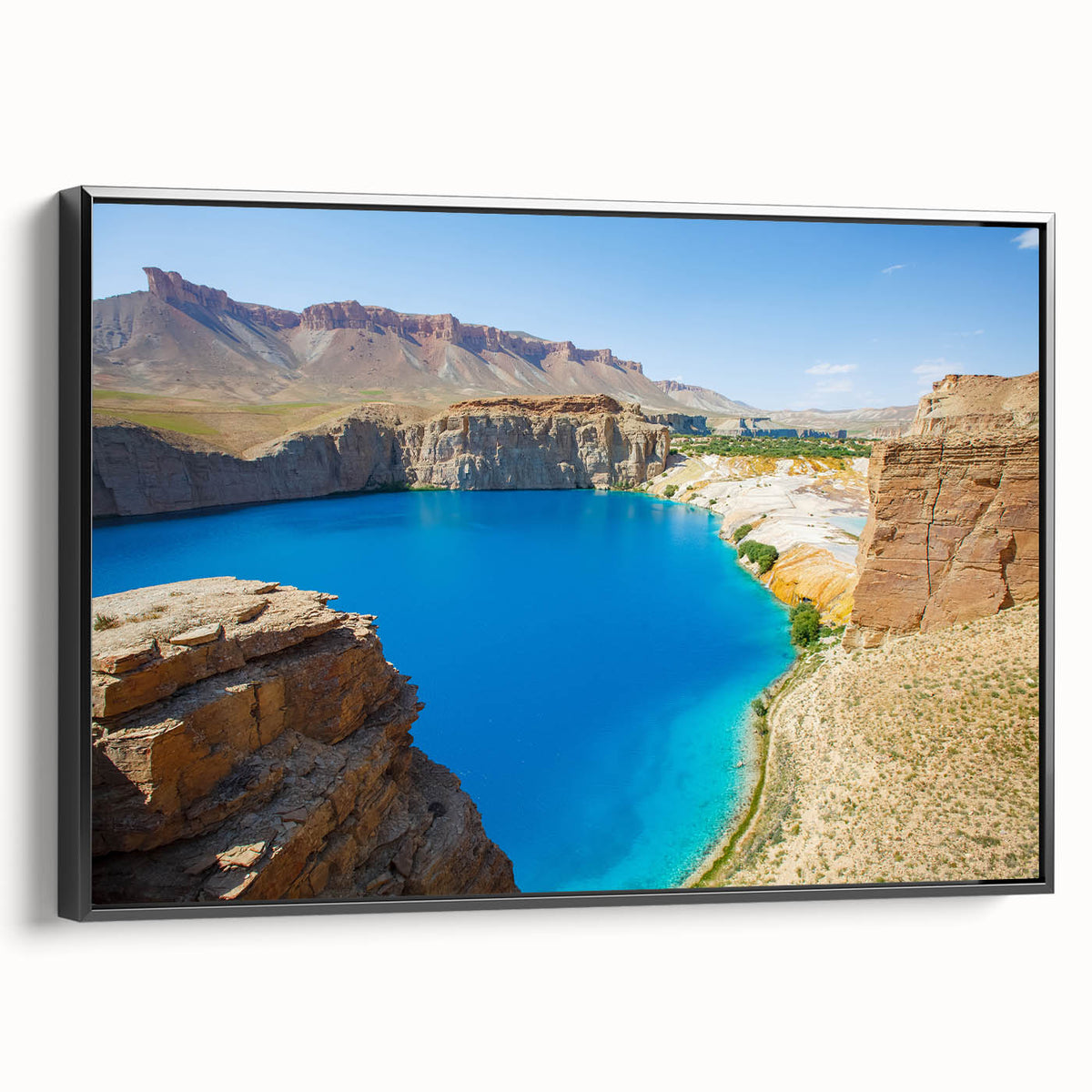 Black and white framed canvas featuring a vintage landscape painting of Middle Eastern scenery, ideal for bedroom wall art.