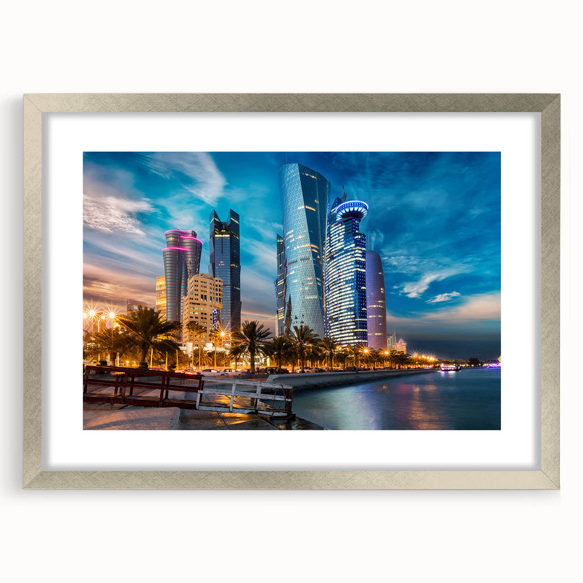 Textured abstract art print of Middle Eastern scenery in muted earth tones, framed in silver, suitable for bedroom decor.