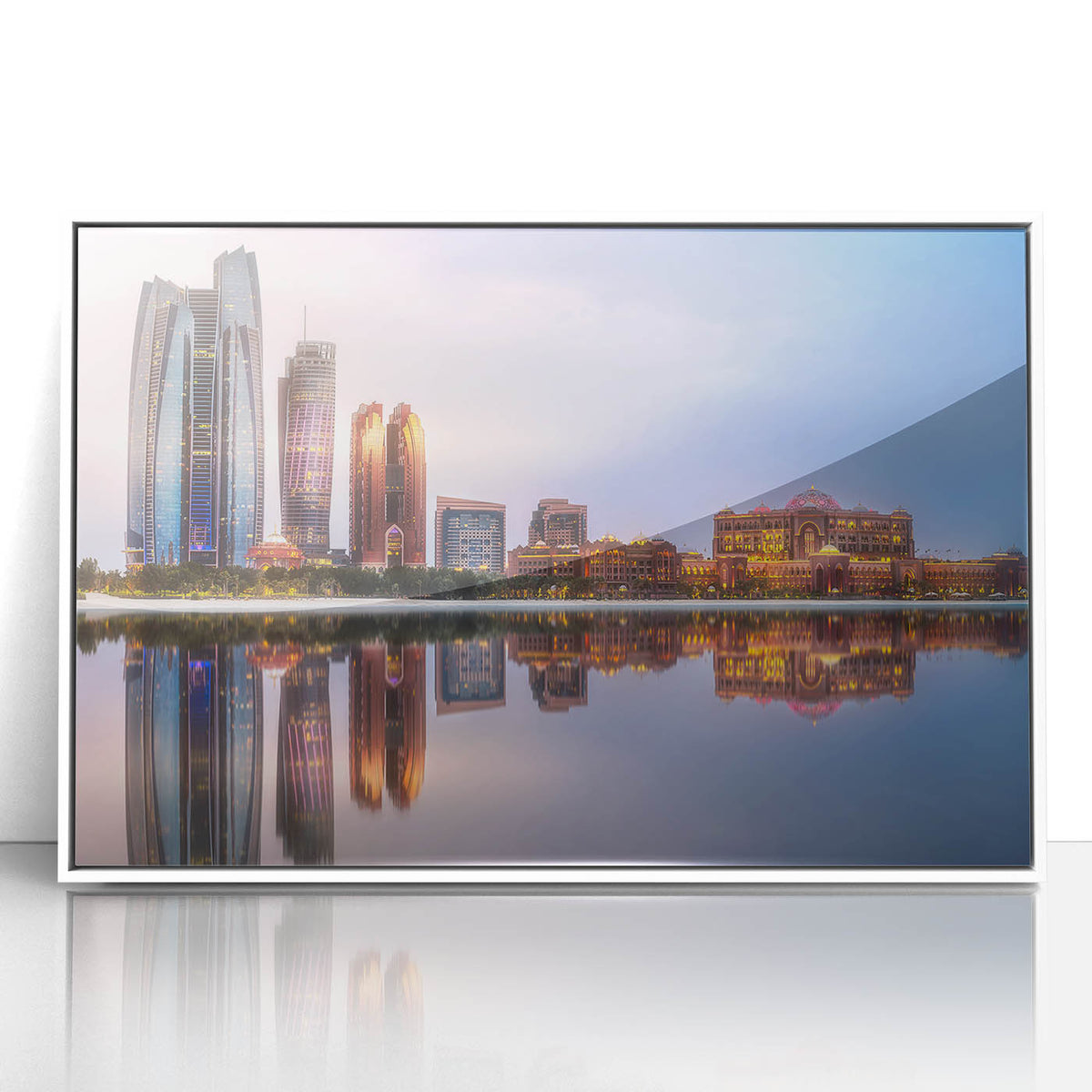 Acrylic print of Abu Dhabi skyline in subdued gray and white tones, framed in white, suitable for modern art wall decor.