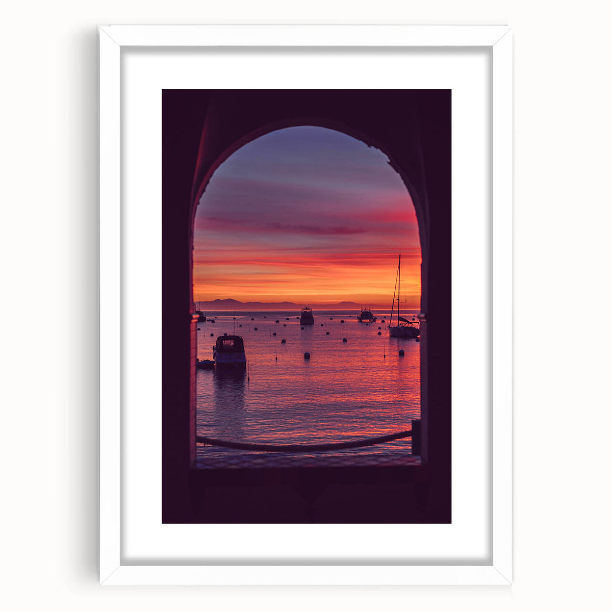 Abstract art print of Catalina, California in muted blue and green tones on a white framed canvas.