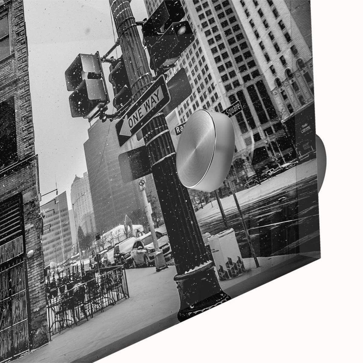 Large abstract wall art of Detroit skyline in muted grays and blues on acrylic glass, suitable for dining room decor.