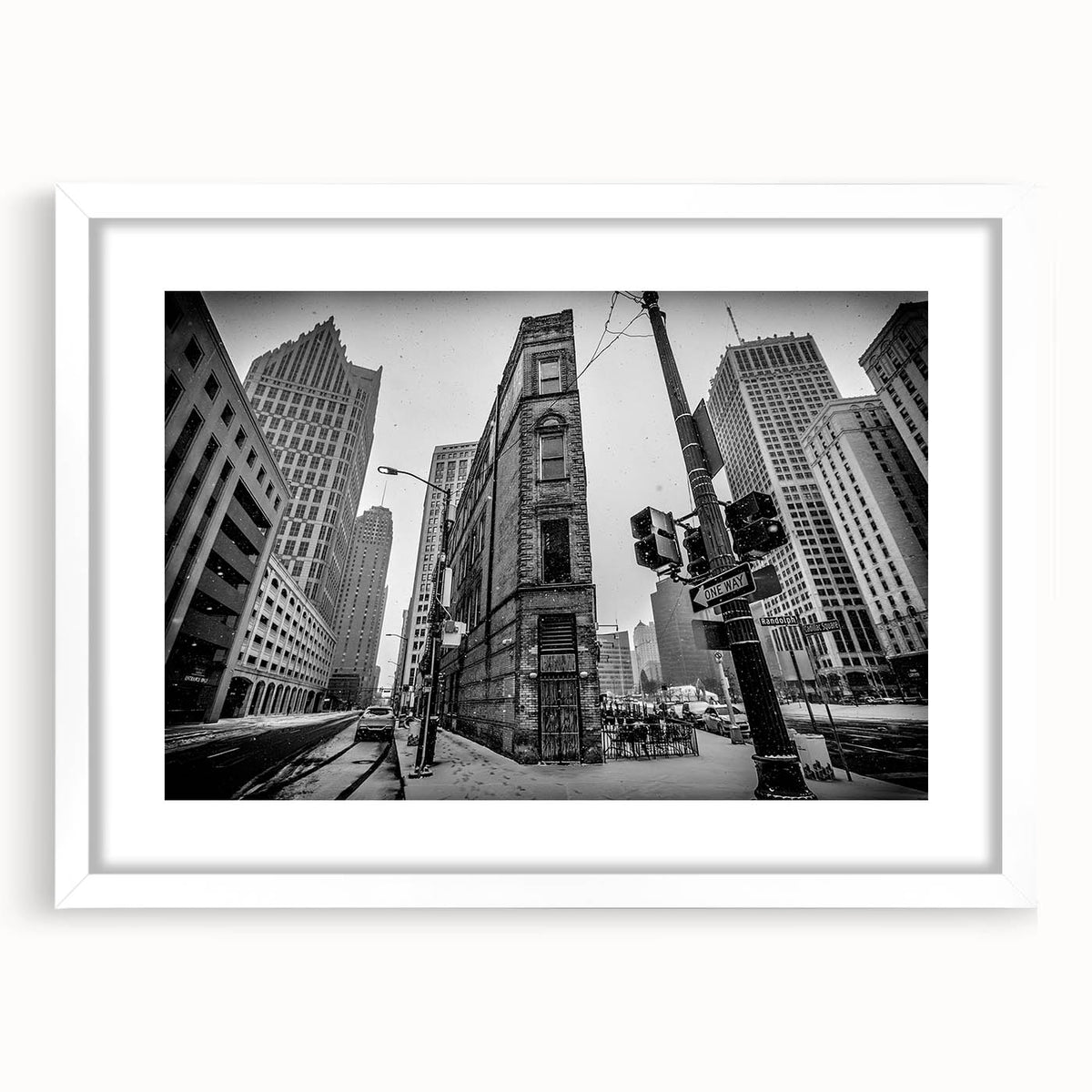 Abstract art print of Detroit skyline in muted gray and blue tones on a framed white mat, ideal for dining room decor.