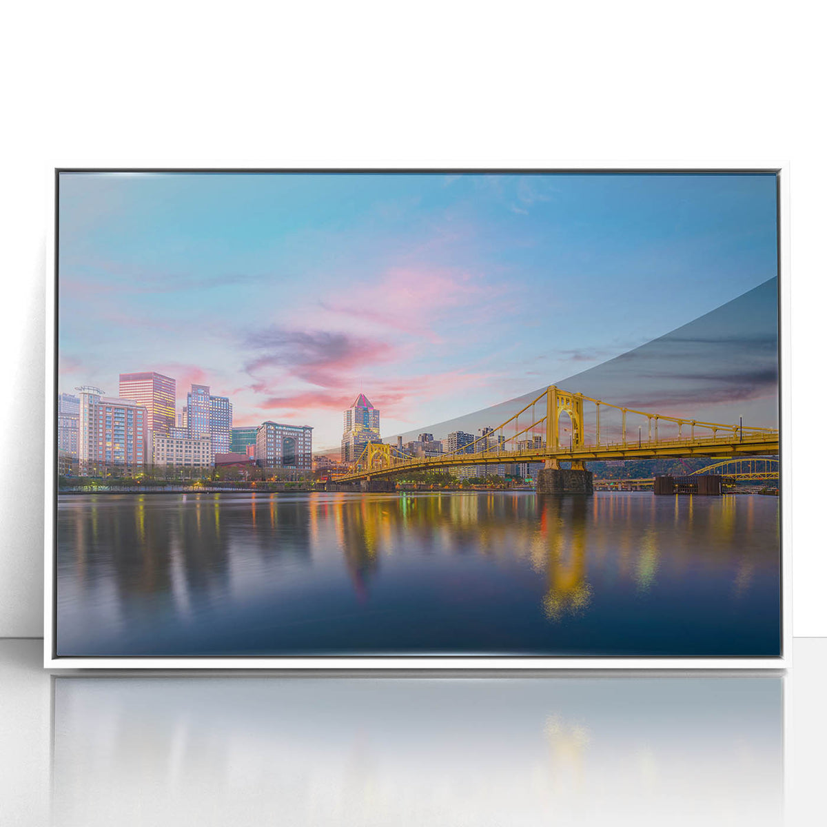 Art deco poster depicting the Pittsburgh skyline in muted gray and blue tones on a framed acrylic.