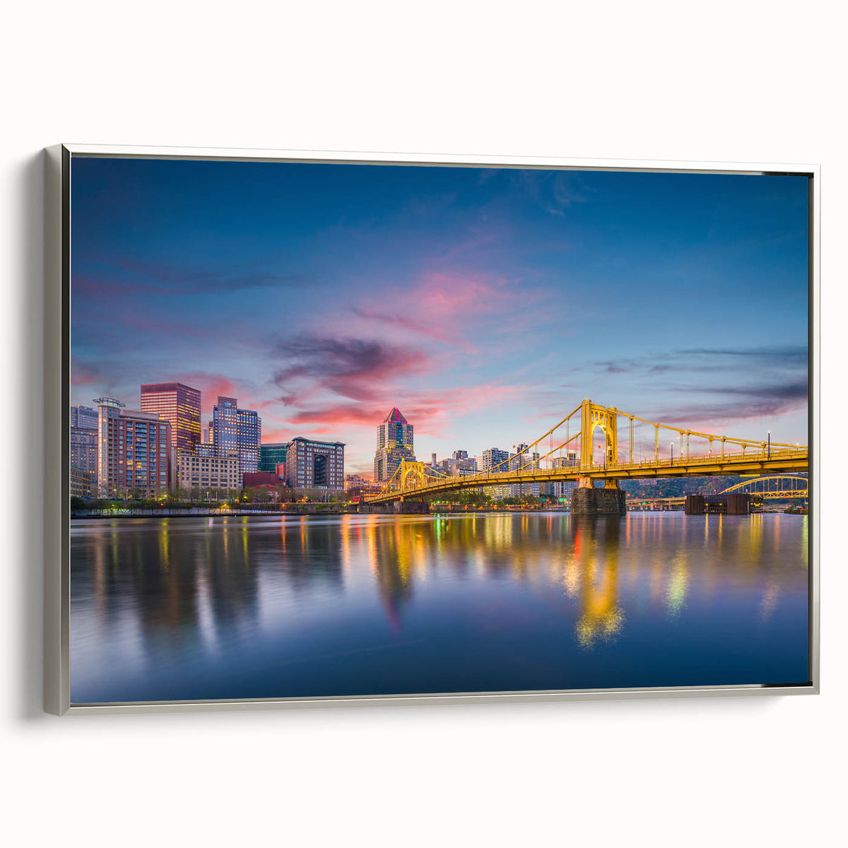 Landscape art painting of Pittsburgh with colorful skyline on silver-framed canvas, ideal for office decor.