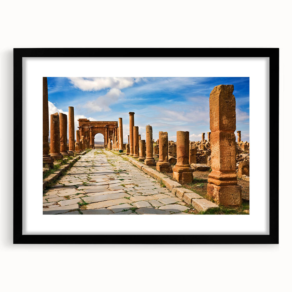 Extra large abstract art print featuring a textured, colorful depiction of an Algerian landscape on a framed black canvas.