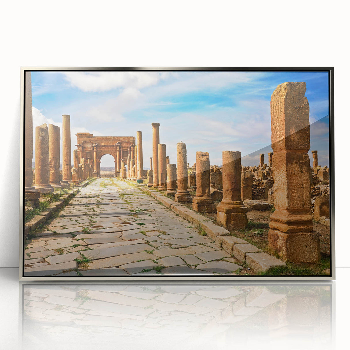 Art deco poster featuring an Algerian landscape in muted earth tones on a silver-framed acrylic print.