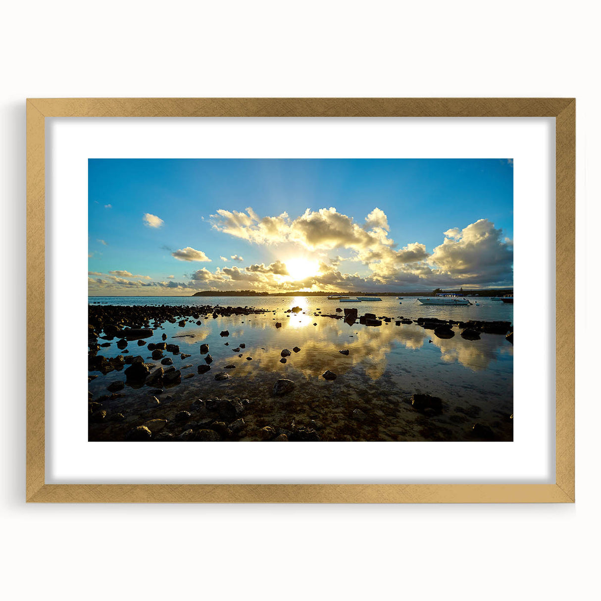 Textured art print of abstract African scenery in earthy tones on a gold-framed canvas, suitable for bedroom decor.