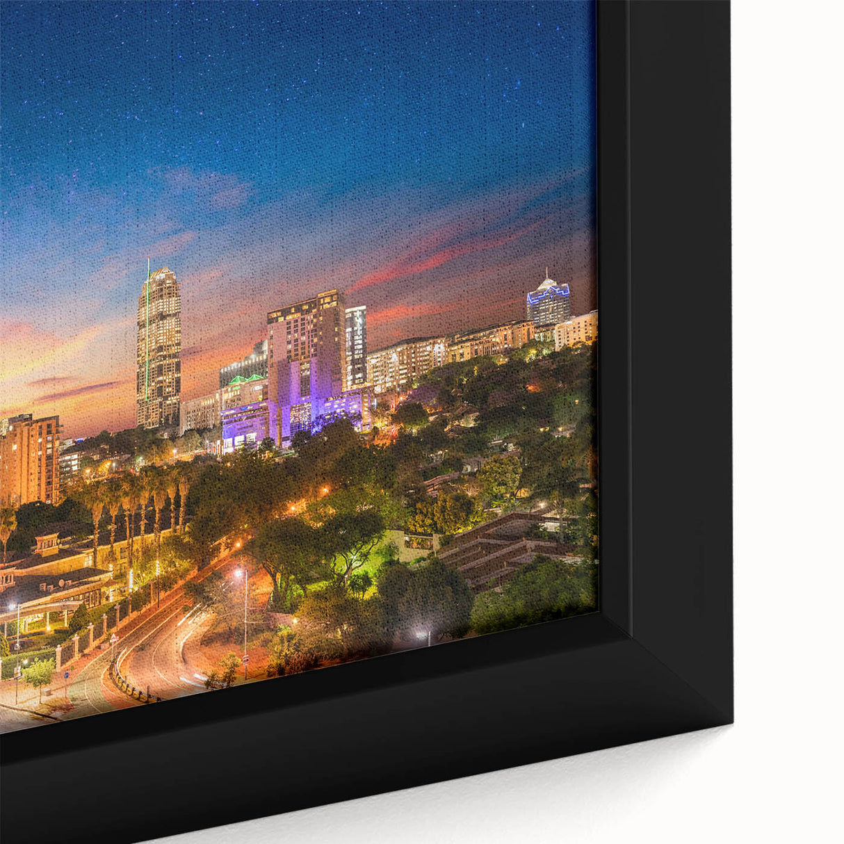 Black wall art featuring a textured, colorful African landscape on a framed canvas, ideal for large living room decor.