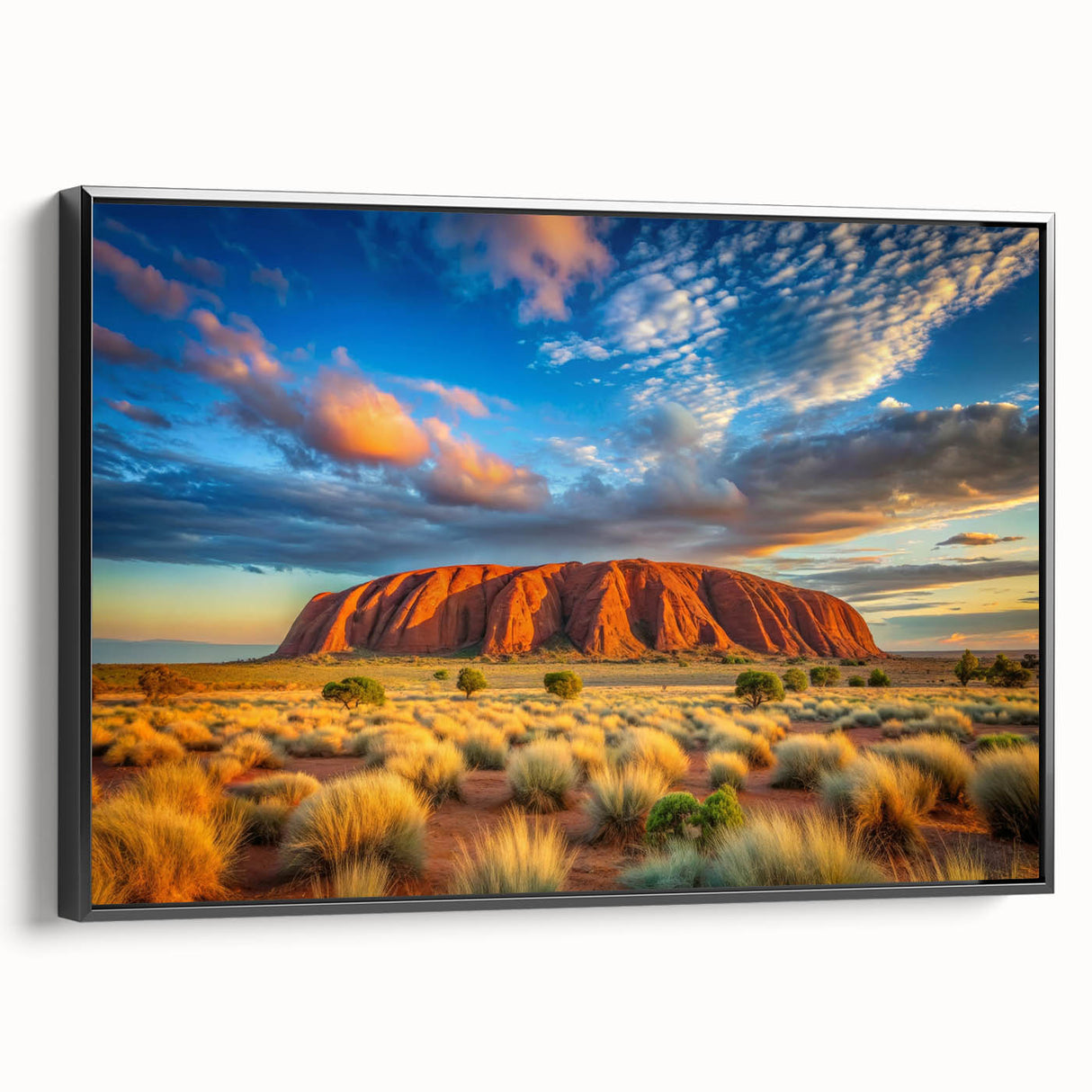 Black and white wall art of Ayers Rock on framed canvas, suited for bedroom ambiance.