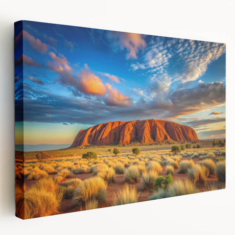 Large art print of Ayers Rock in Australia on stretched canvas, featuring earthy red and orange tones.