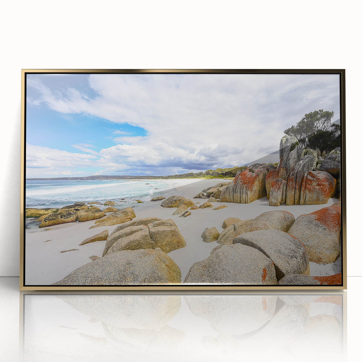 Art deco poster featuring a Tasmania landscape in gold and green tones, framed acrylic.