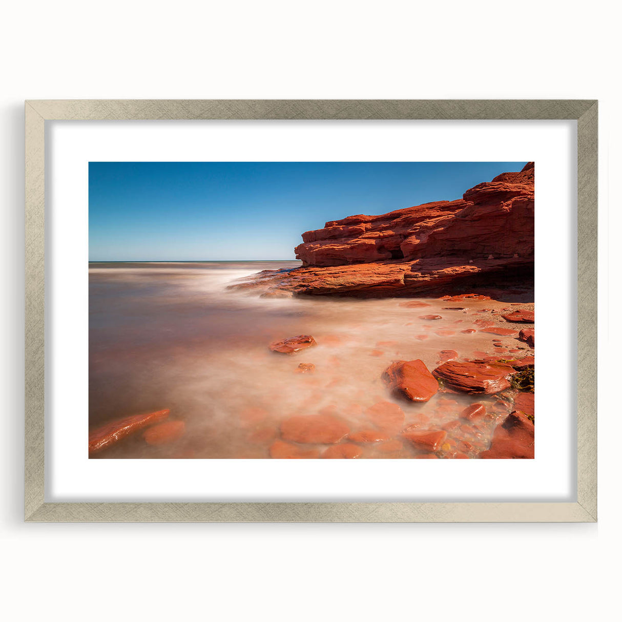 Textured art print of an abstract Prince Edward Island scenery in muted earth tones on a framed canvas.