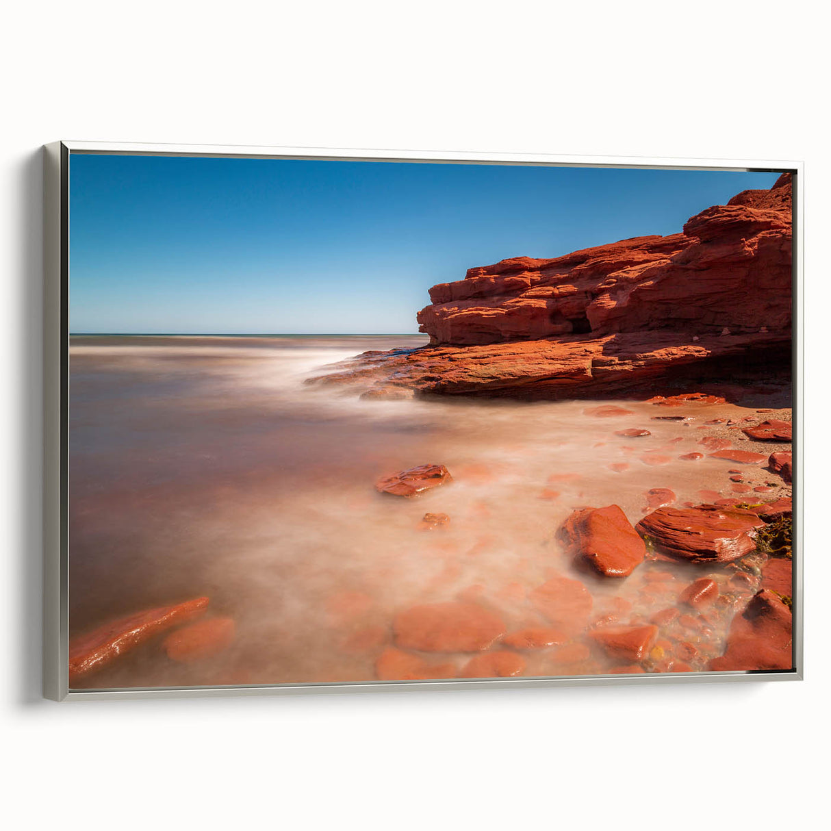 Framed canvas of a vintage-style landscape painting featuring Prince Edward Island in muted earth tones.