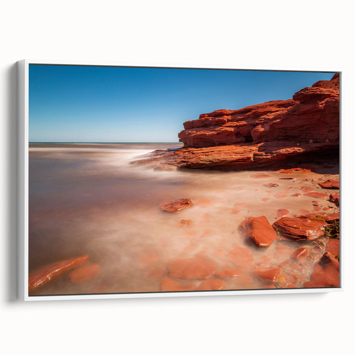 Vintage poster art of Prince Edward, Canada scenery on a framed canvas with a white border, featuring colorful art.