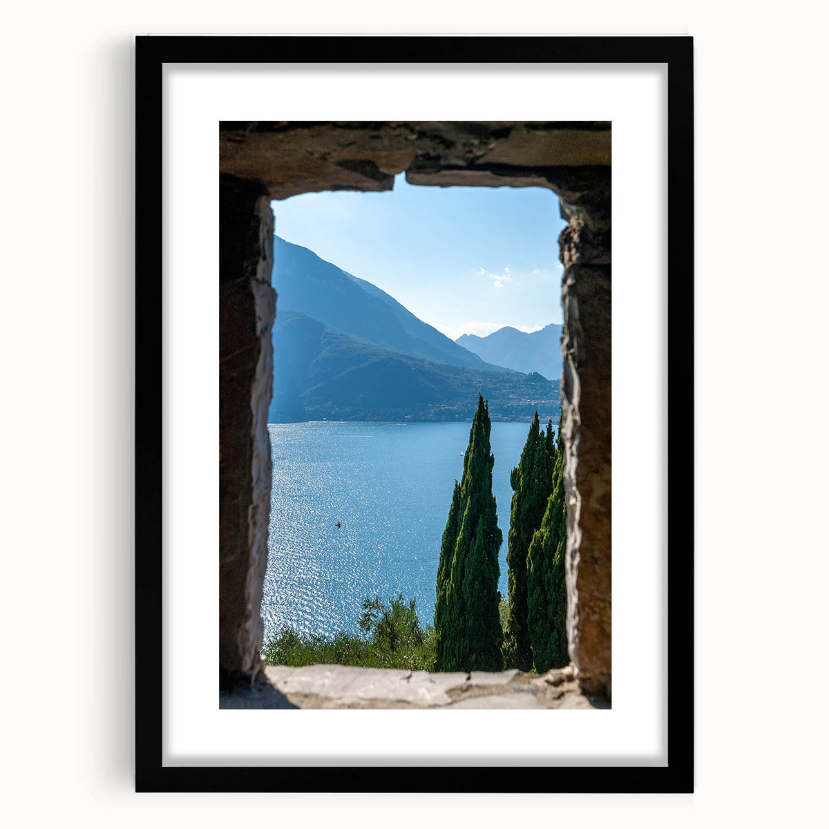 Extra large abstract art print of Lake Como with vibrant colors on a textured canvas, framed in black.