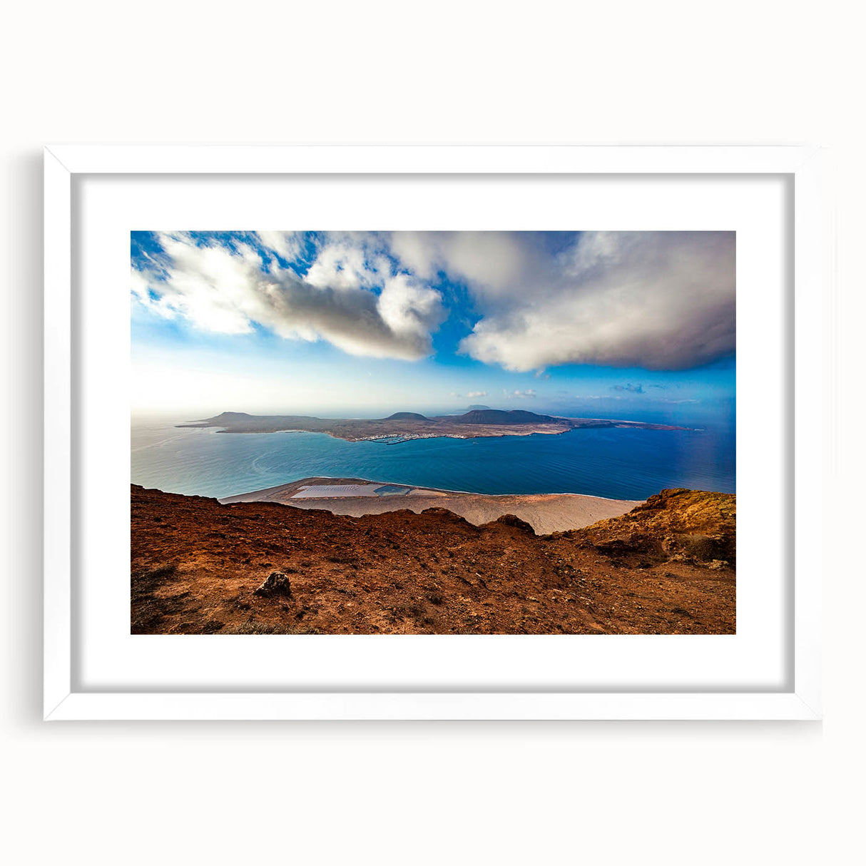 Textured abstract art print depicting a muted color palette of Europe's Canary Islands on a framed white mat.