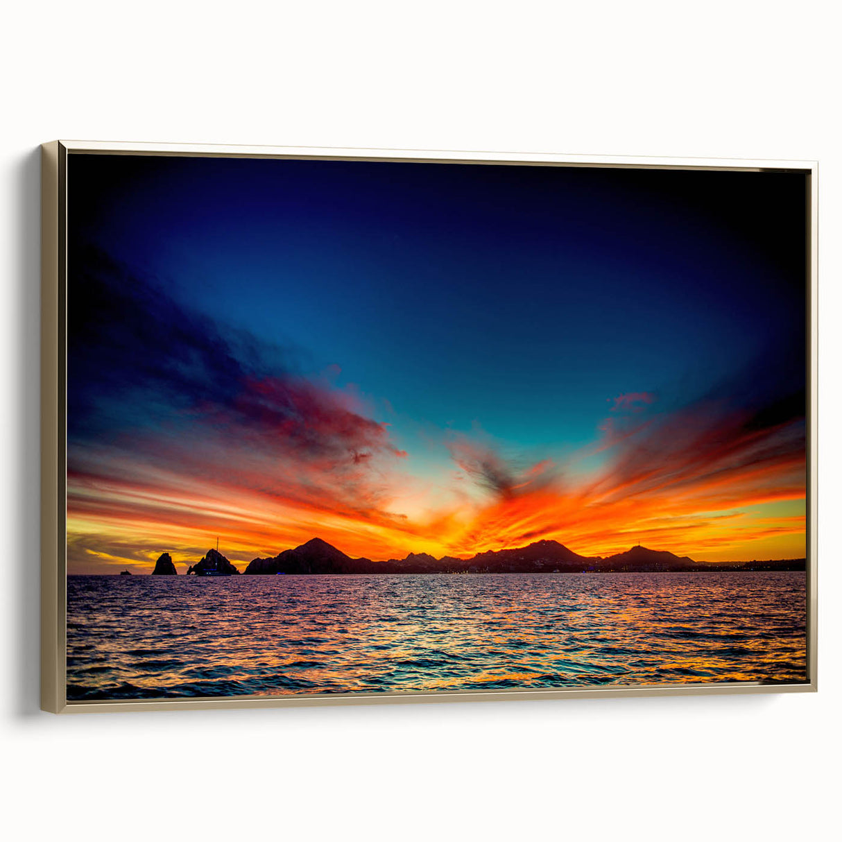 Framed canvas of a vintage-style landscape painting depicting Cabo San Lucas with muted gold and black tones.