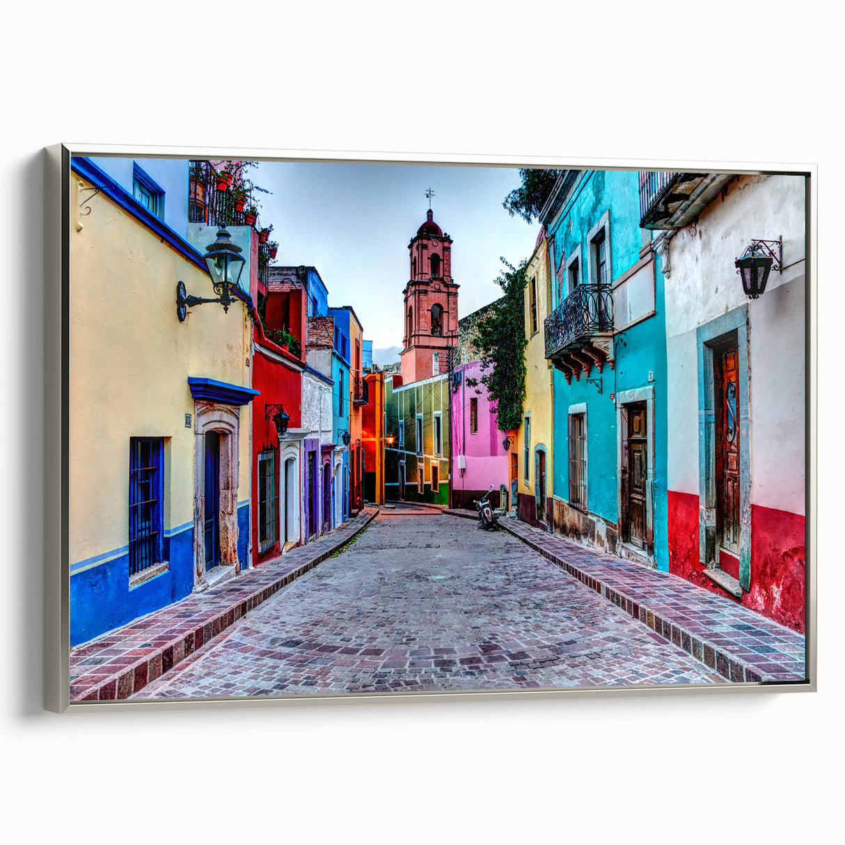 Framed canvas featuring a vintage poster art style landscape of Guanajuato, Mexico, with vibrant, colorful hues.