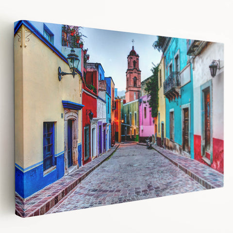 Side view of a stretched canvas featuring a colorful depiction of Guanajuato, Mexico, ideal for kitchen wall art.