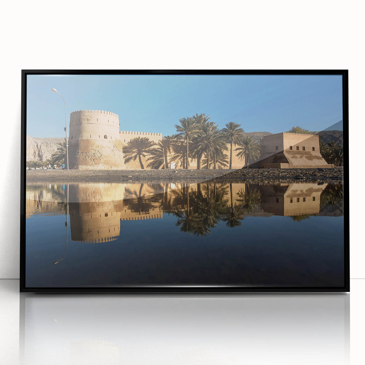Large abstract wall art depicting a Middle Eastern desert scene in muted earth tones on a framed acrylic.