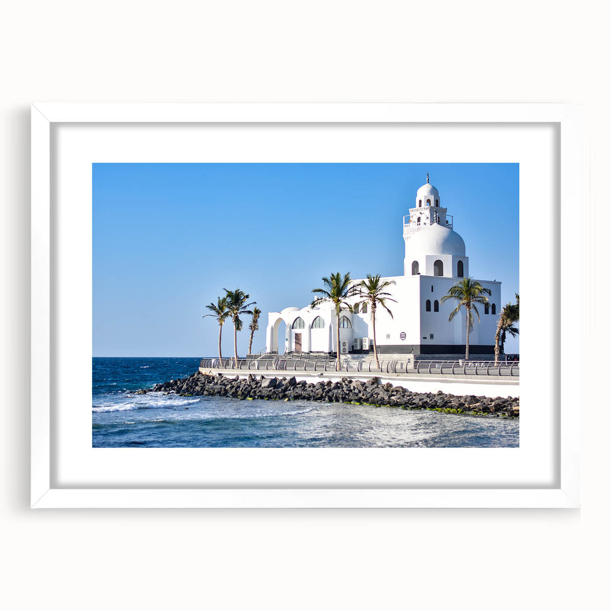 Abstract art print featuring a stylized Saudi Arabian landscape in muted earth tones, framed in white.