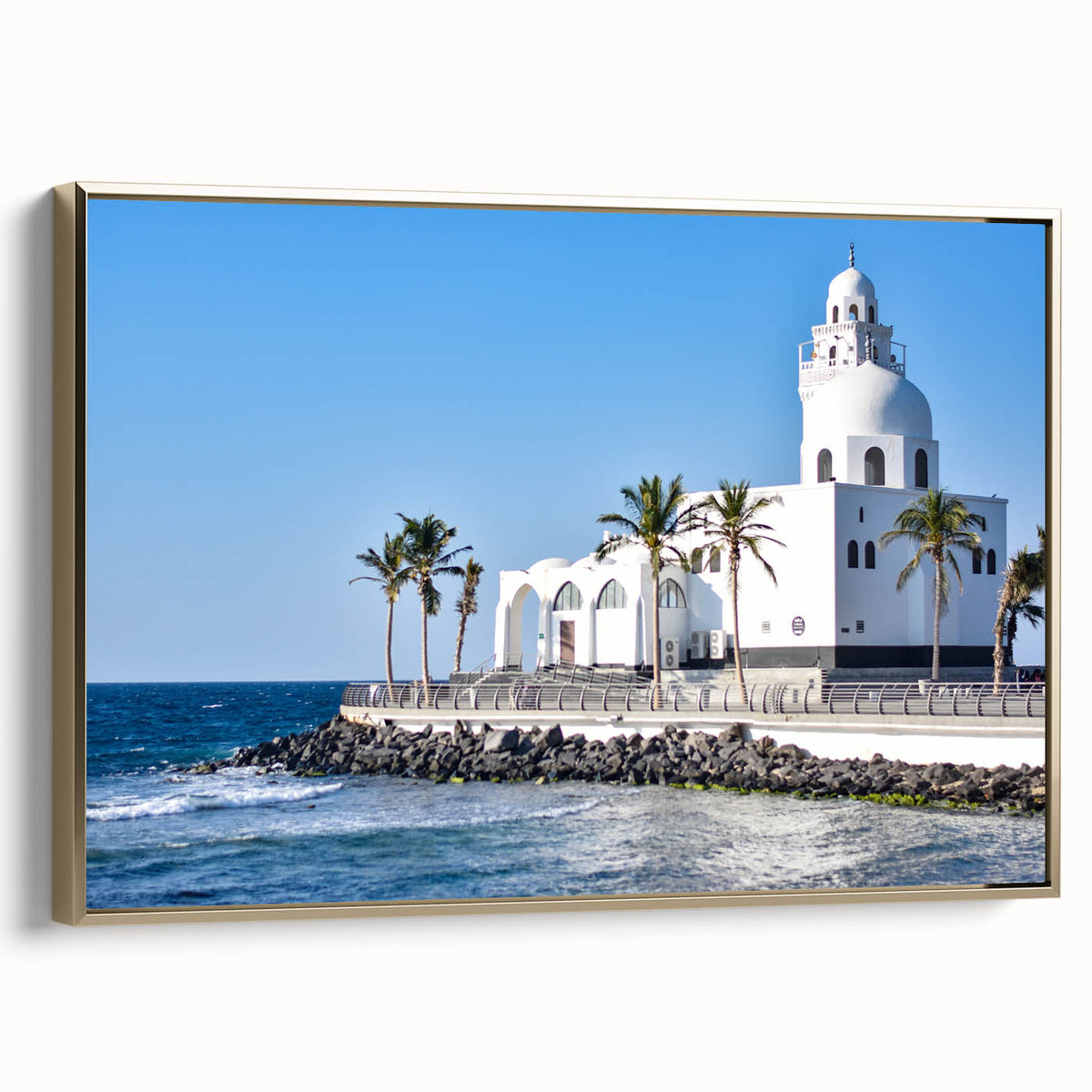 Framed canvas depicting a vintage-style landscape of a Middle Eastern desert scene, in muted gold and black tones.