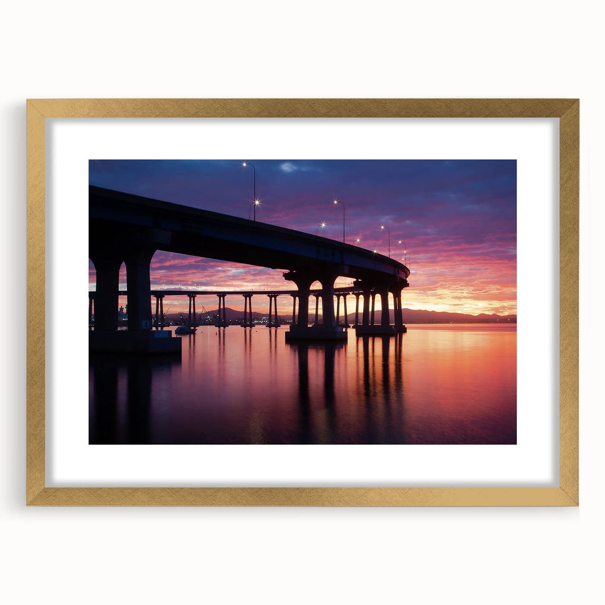 Extra large abstract art print of a textured California scenery in a gold frame, suited for living room decor.