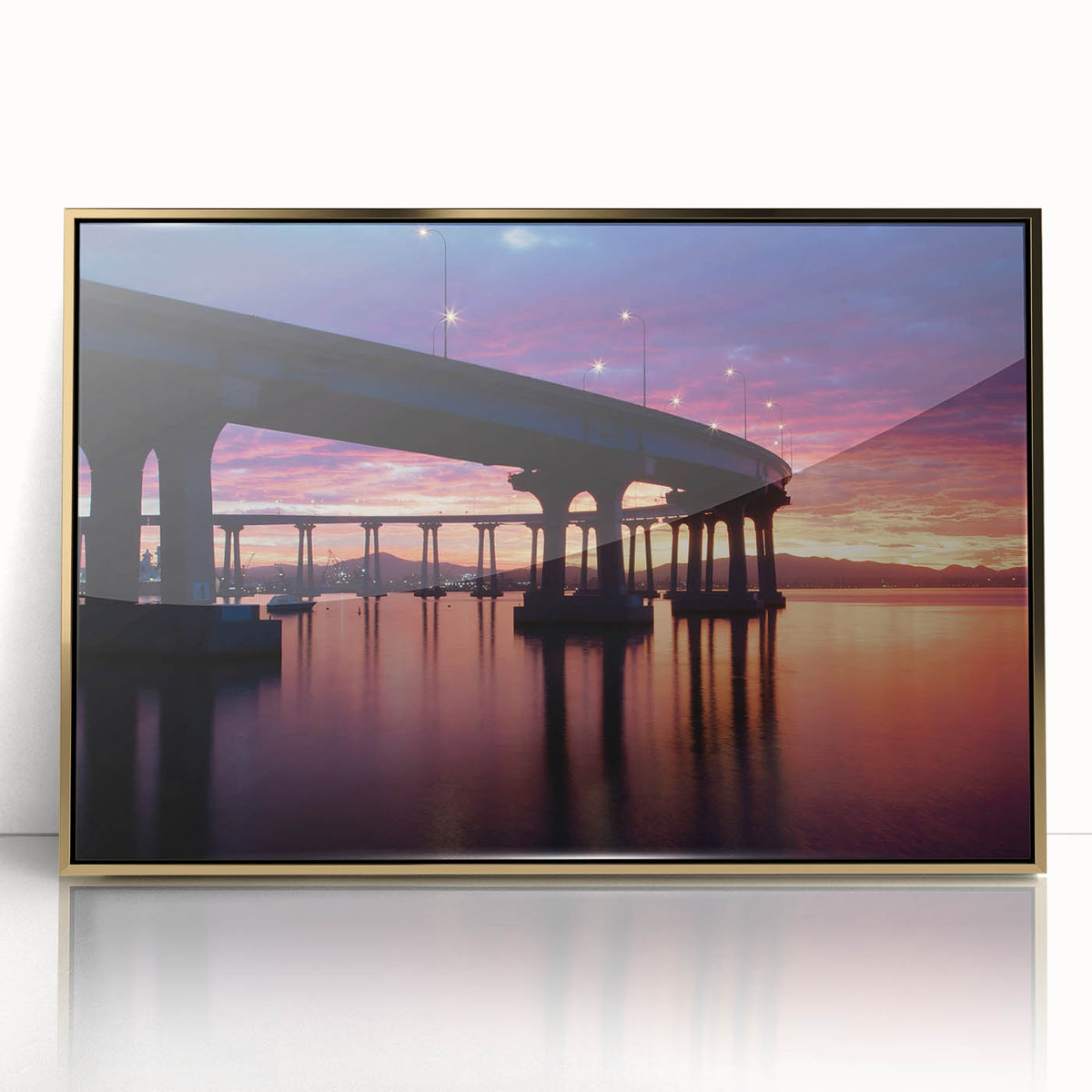 Large art print of Coronado, California scenery in mid-century modernist style on gold-framed acrylic.