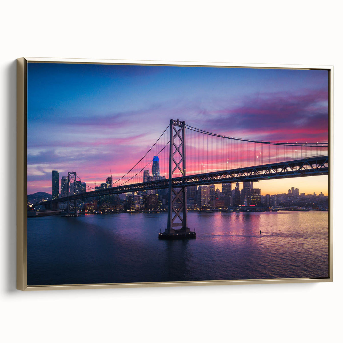 Framed canvas wall art depicting a vintage-style San Francisco landscape in black and gold tones, ideal for bedroom decor.