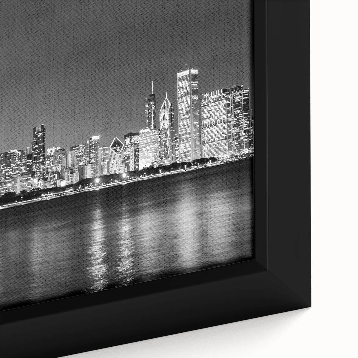 Close-up of a textured black wall art featuring a colorful Chicago skyline on an extra large framed canvas.