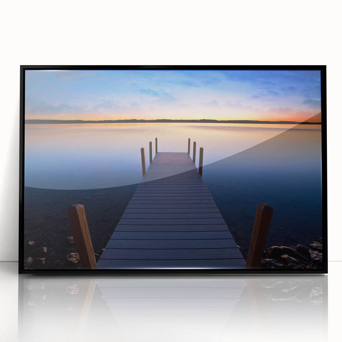 Large abstract wall art of Lake Michigan with muted blue and gray tones on a black framed acrylic.