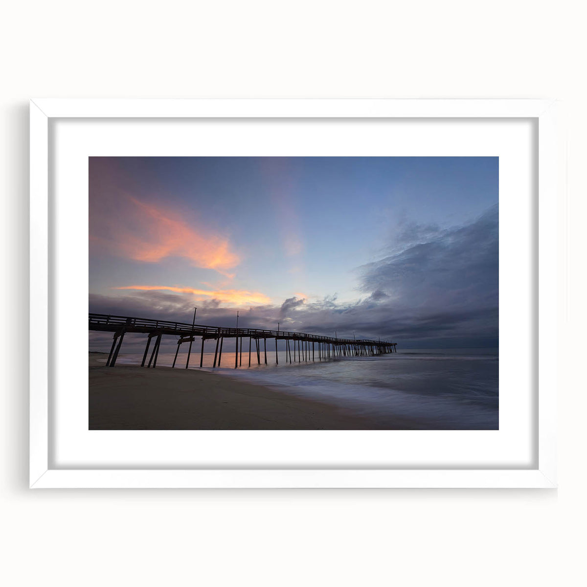 Abstract art print of the Outer Banks in North Carolina, featuring muted blue and gray tones on a framed white mat.