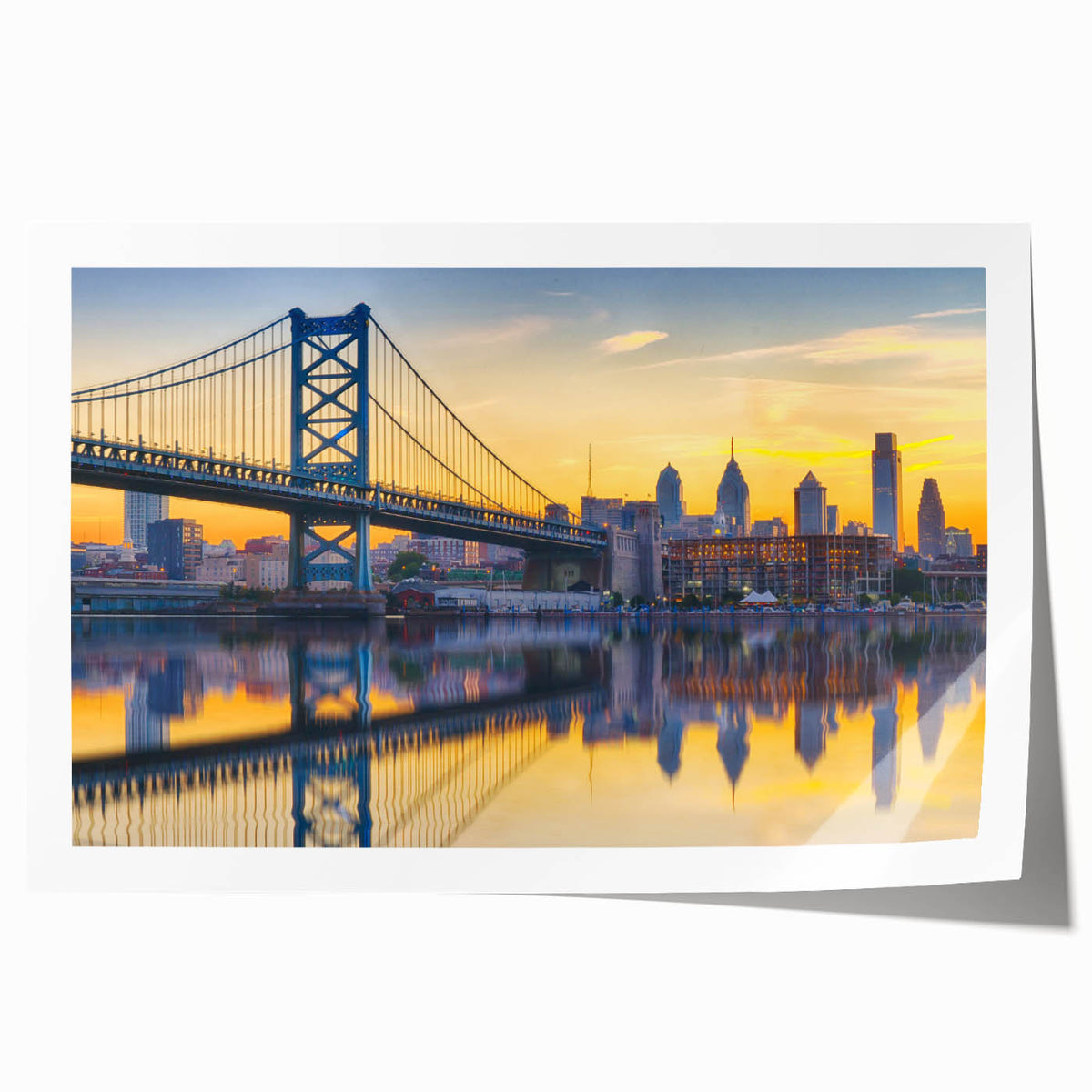 Rolled print of Philadelphia skyline in muted gray and blue tones, suitable for art wall dining room.