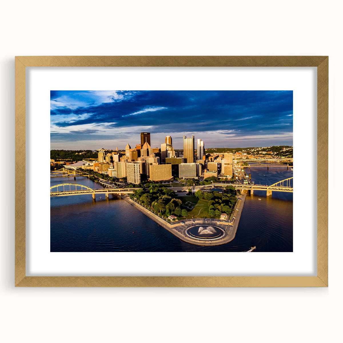 Extra large abstract art print of Pittsburgh skyline in textured gold frame, suitable for living room decor.