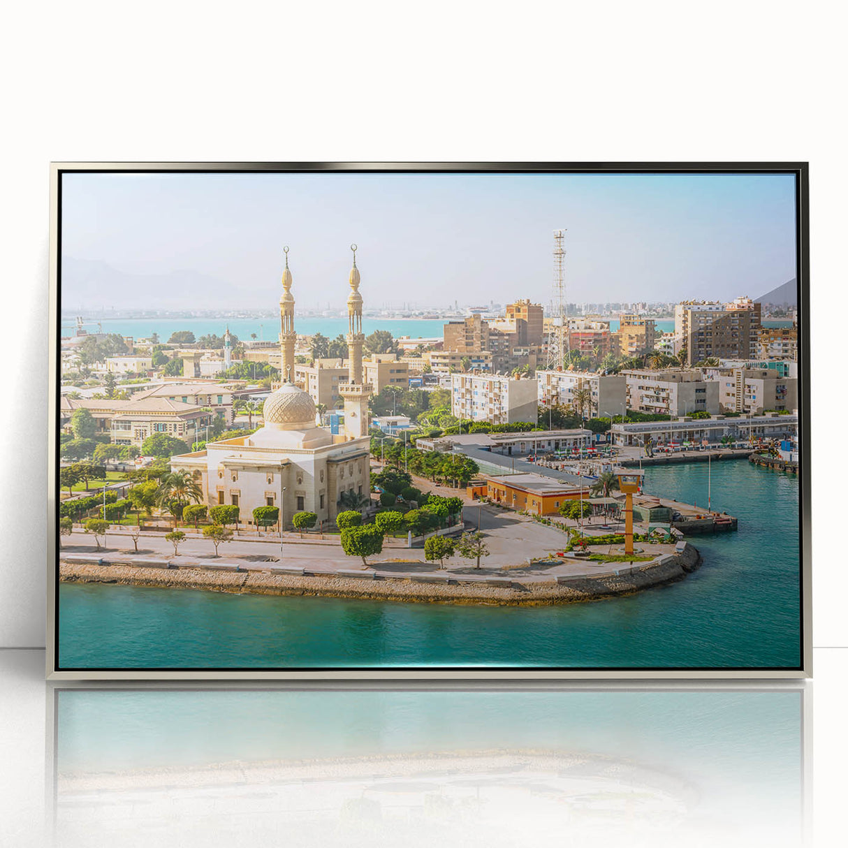 Art deco poster of Egyptian scenery in silver framed acrylic, featuring muted earth tones, ideal for modern art wall decor.