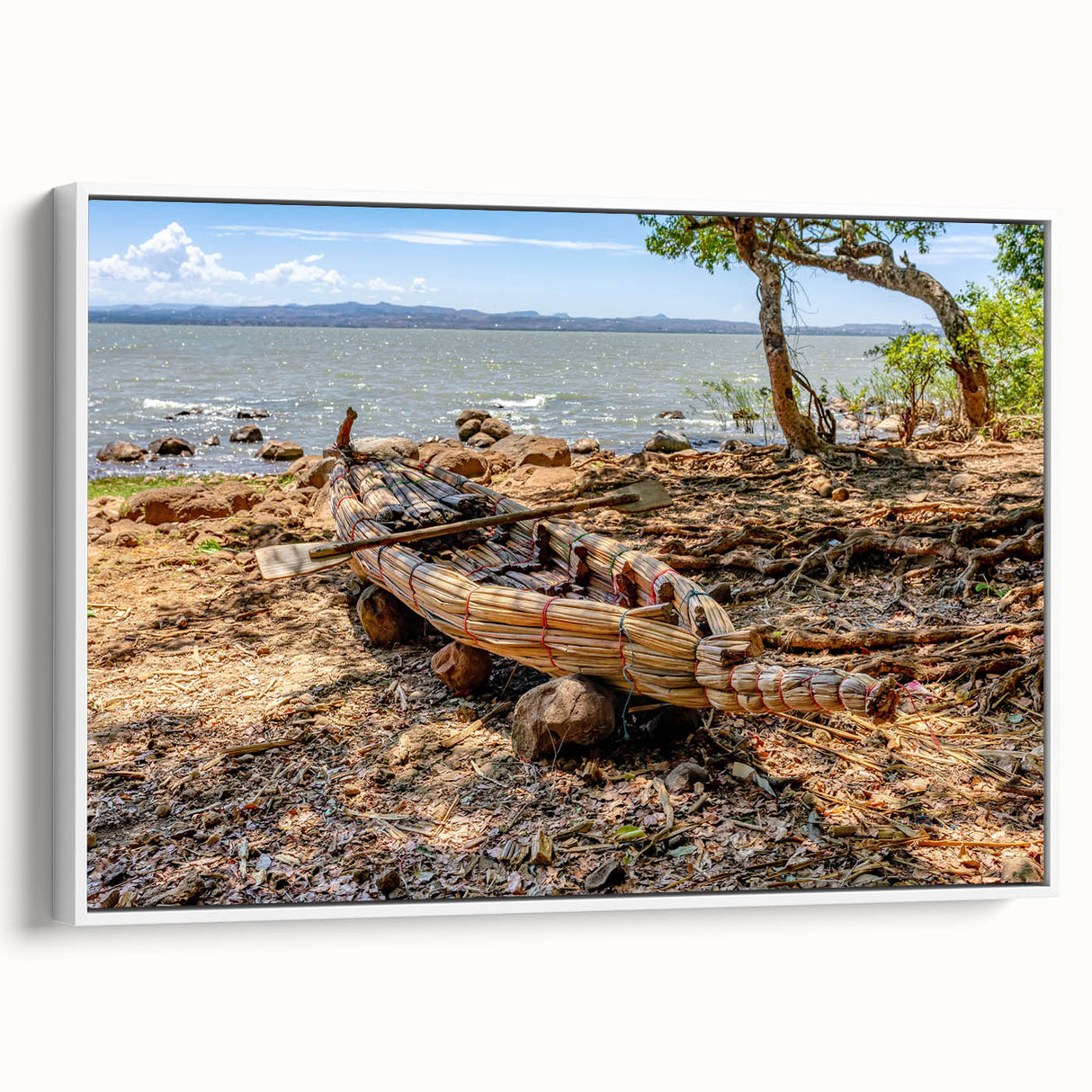 Framed canvas of an Ethiopian landscape in muted earth tones, ideal for bedroom wall art.