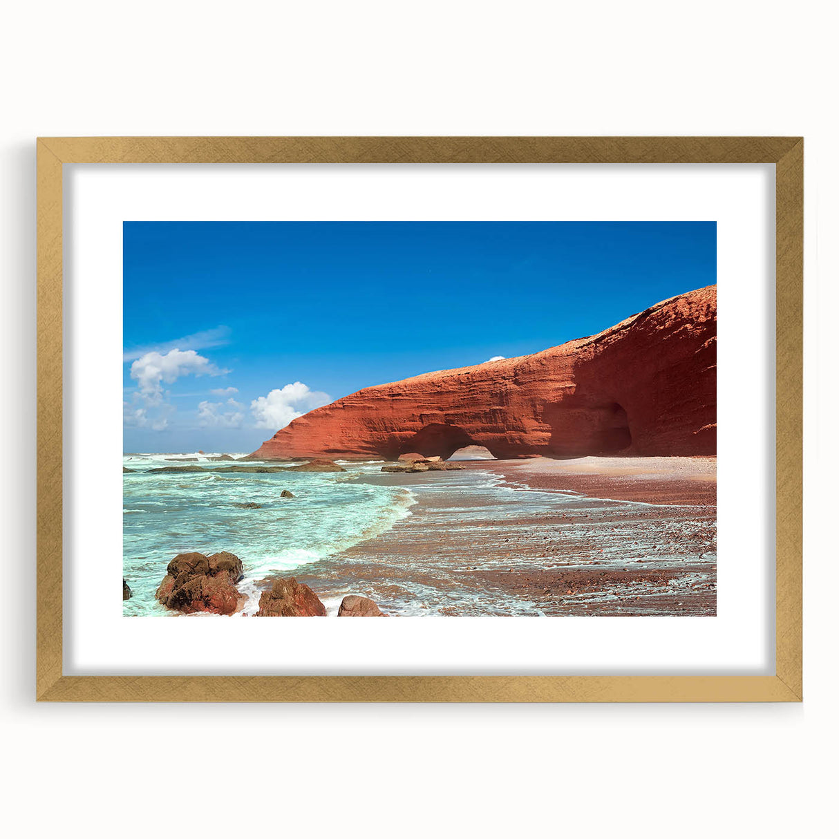 Textured abstract art print of Moroccan scenery in muted earth tones, framed in gold, ideal for bedroom art.