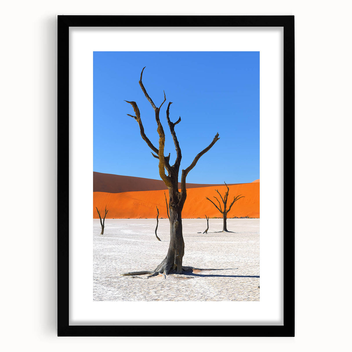 Extra large abstract art print depicting a colorful, textured African scenery on a framed black canvas.