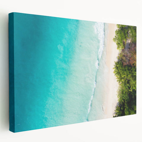 Large stretched canvas featuring a serene Seychelles beach scene in soft blue and green tones, suitable for kitchen wall art.