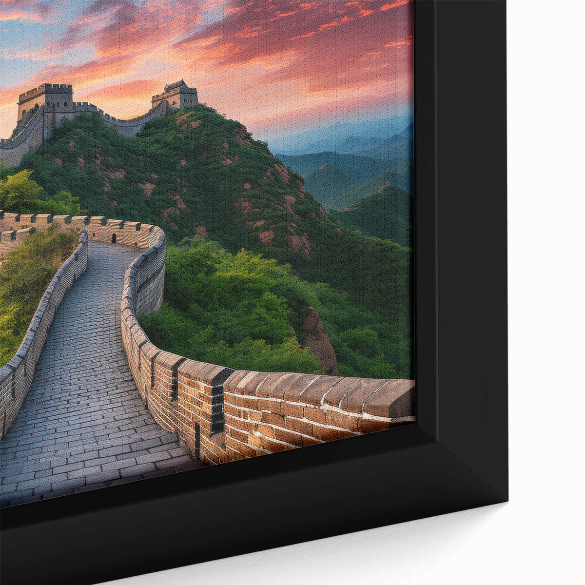 Close-up of a textured black wall art depicting the Great Wall of China, with vibrant color accents on a framed canvas.
