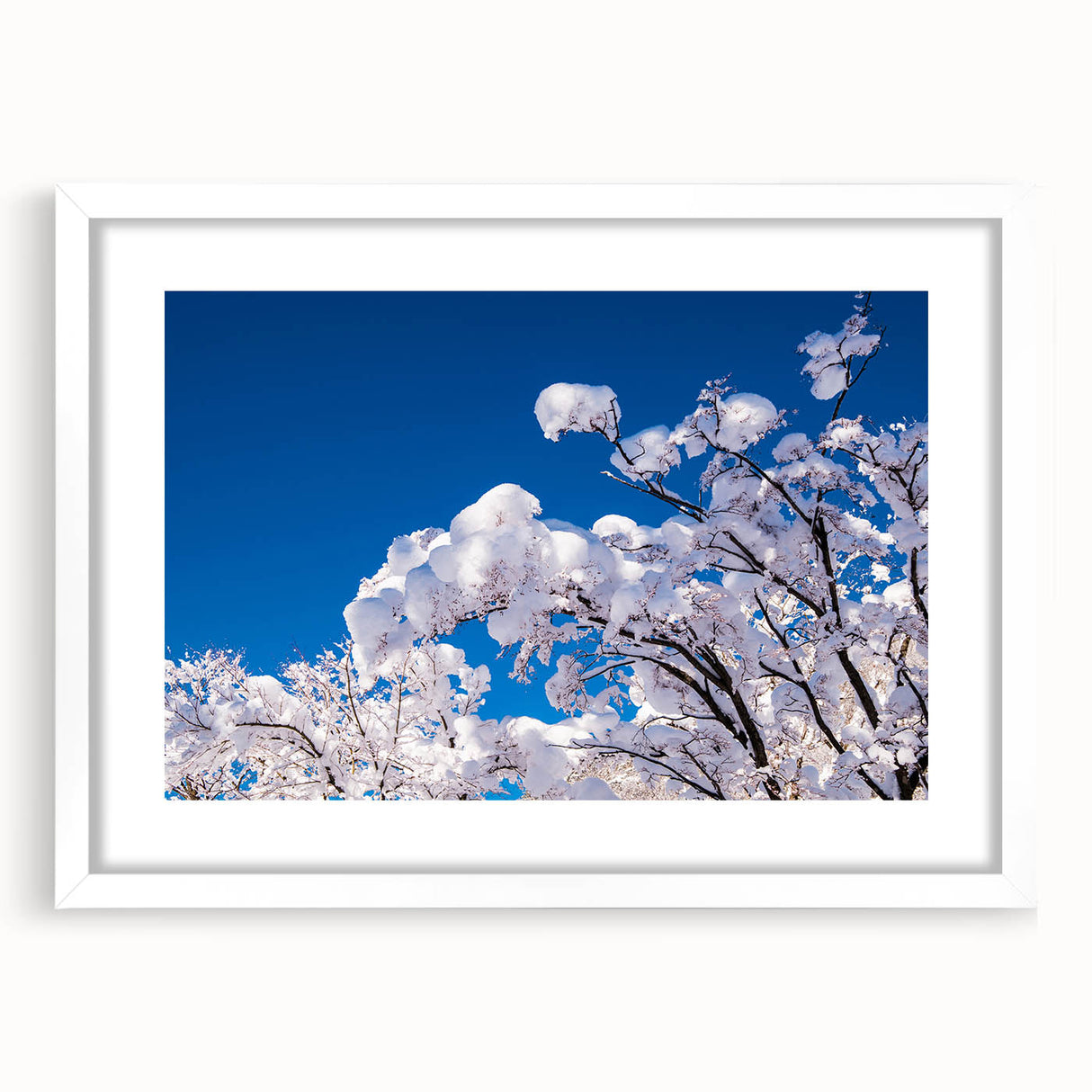 Abstract art print depicting a serene Korean landscape in muted green and blue tones, framed with a white mat.