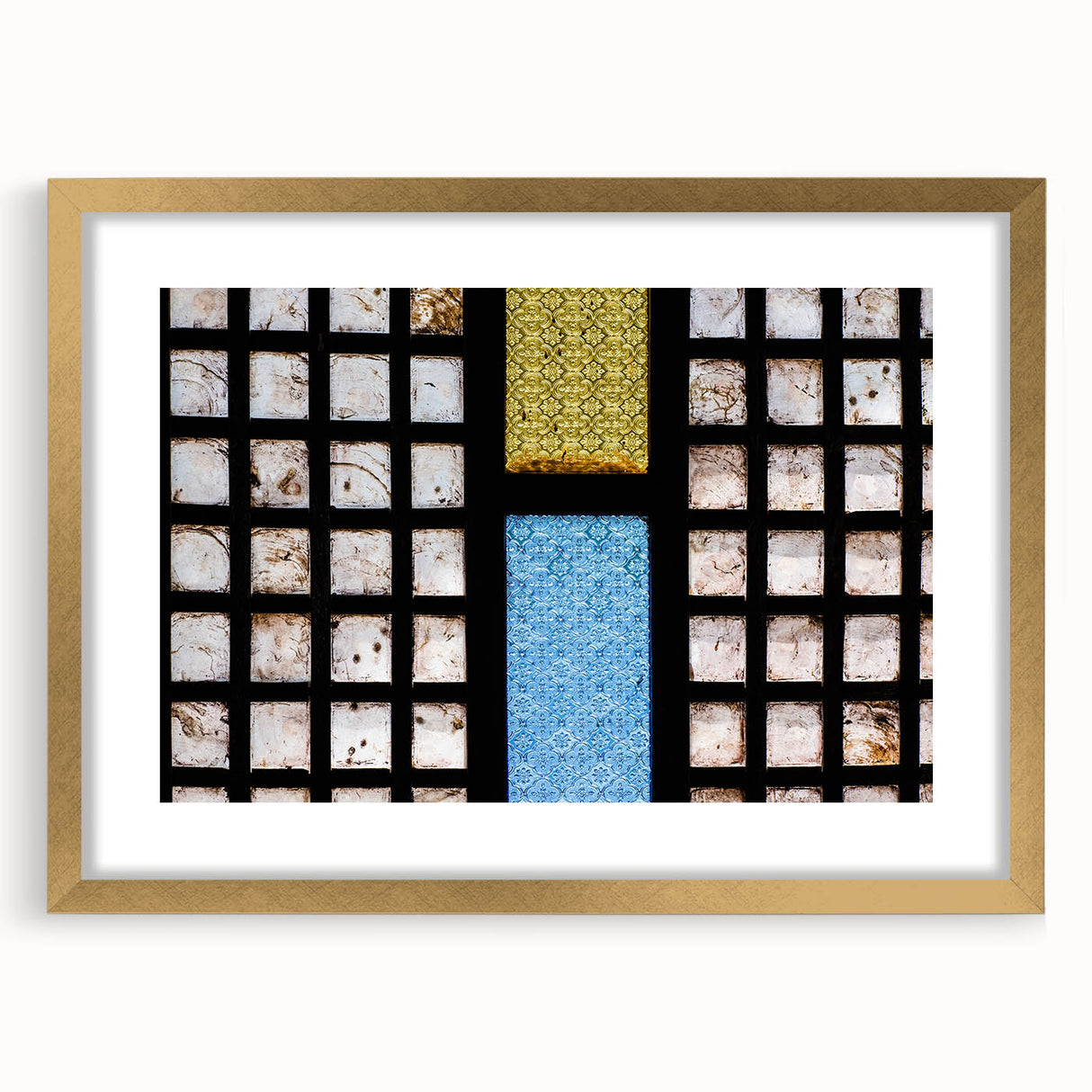 Extra large wall art featuring an abstract depiction of a Philippine landscape in textured gold tones, framed with a mat.