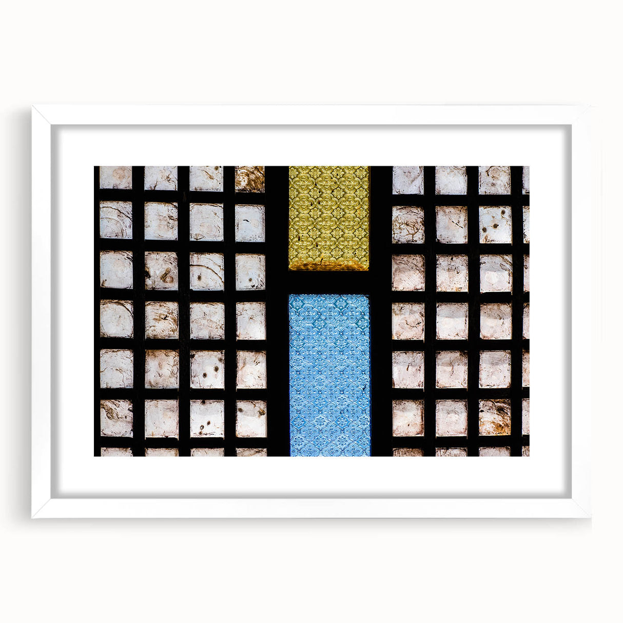 Abstract art print of a Philippine landscape in muted earth tones on a framed white mat, ideal for dining room decor.