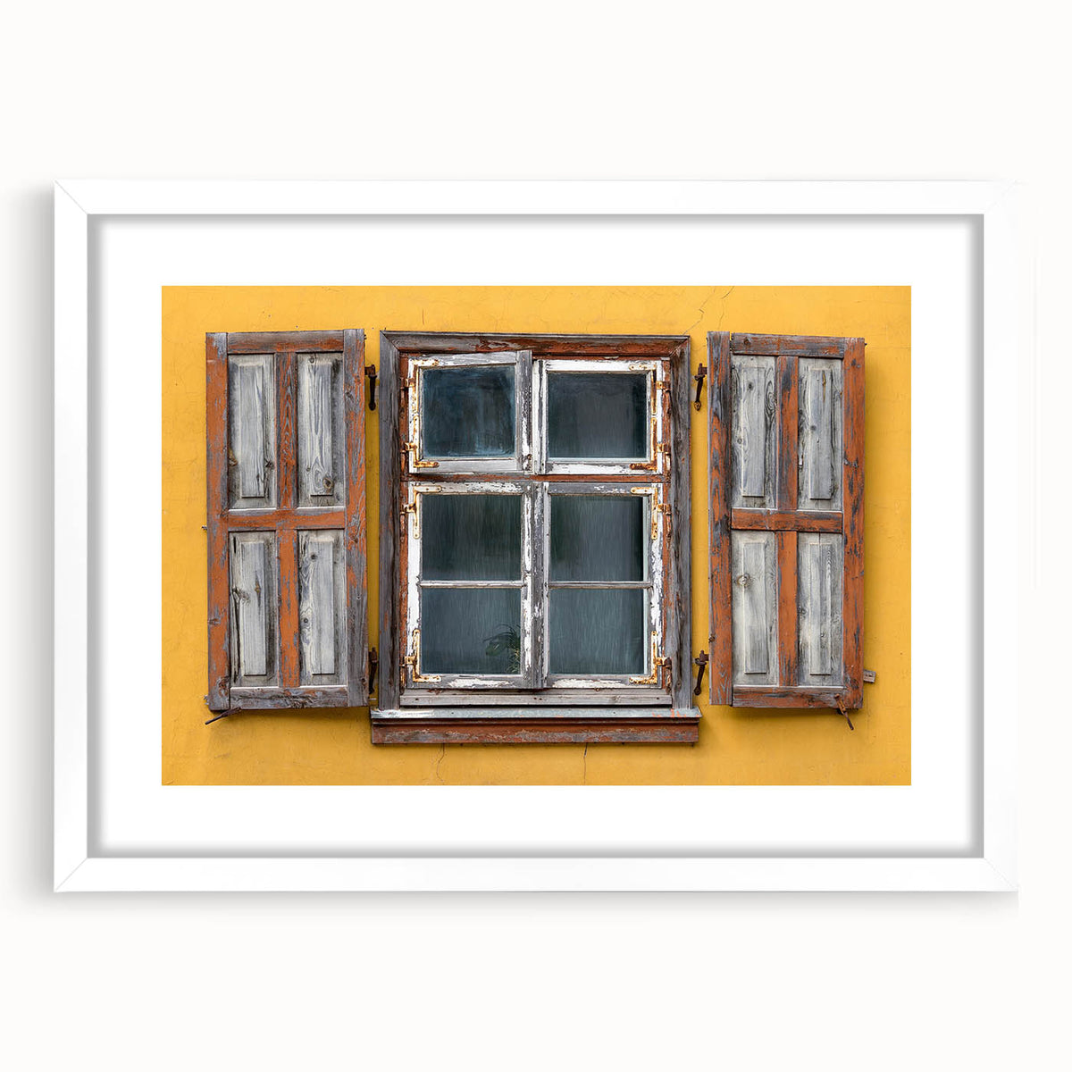 Textured abstract art print depicting Caribbean scenery in muted blue and green tones on a framed white mat.