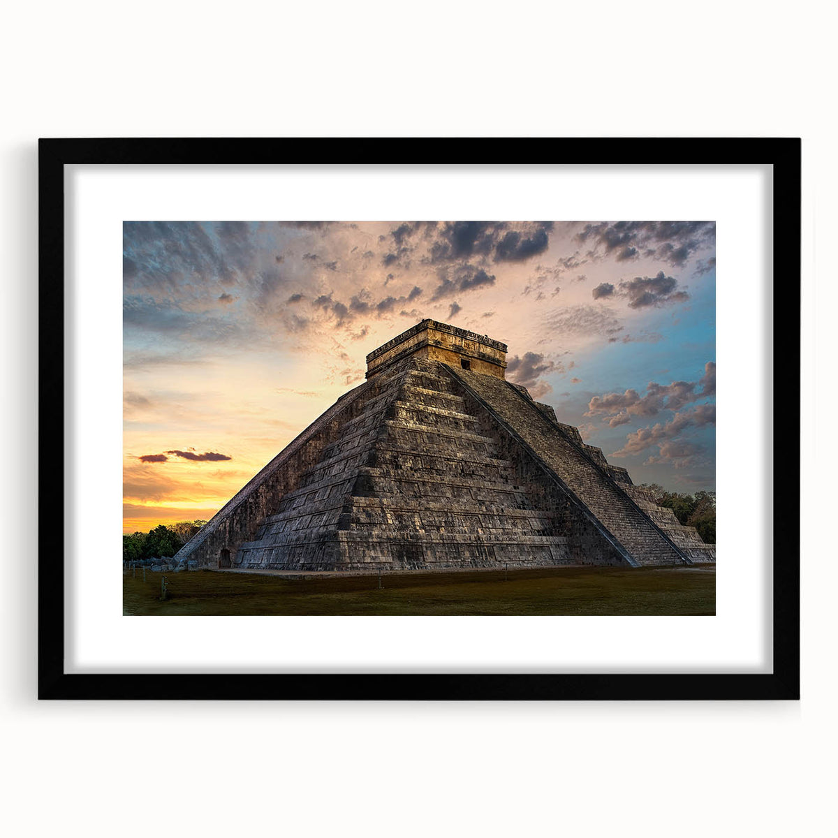 Colorful abstract art print of Central America scenery on textured canvas, framed in black.